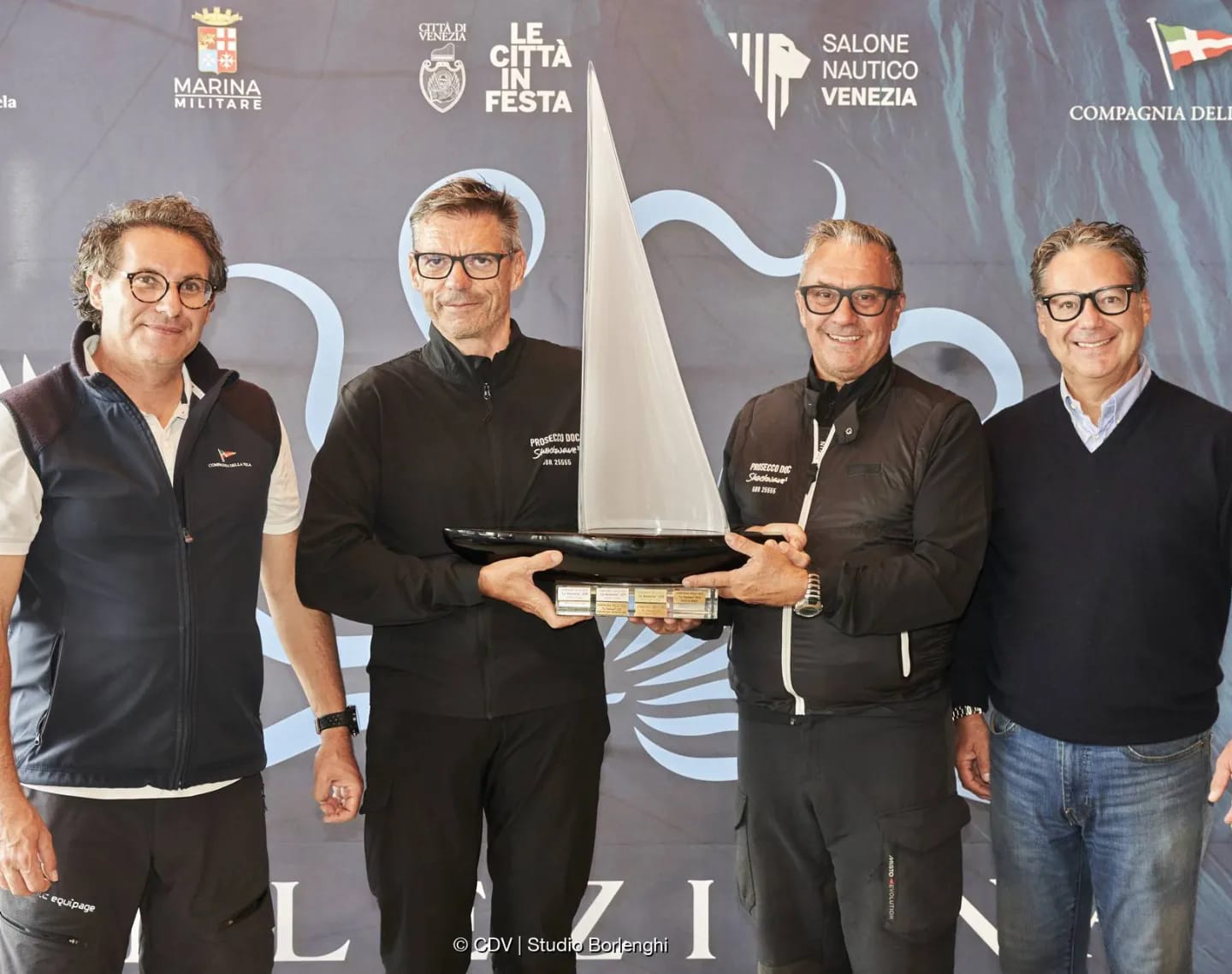 Riccardo Bonetti and Prosecco DOC navigator Paolo Piccione collect the Veleziana Trophy, awarded to the first Overall